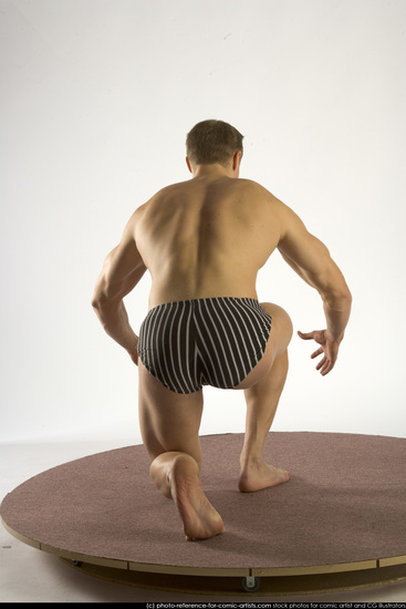 Man Young Muscular White Martial art Kneeling poses Underwear