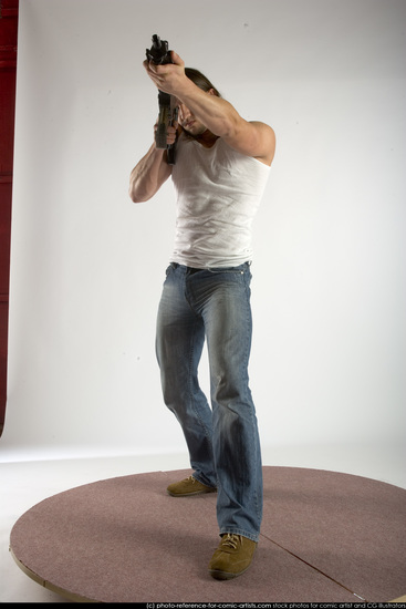 Man Young Muscular White Fighting with submachine gun Standing poses Casual