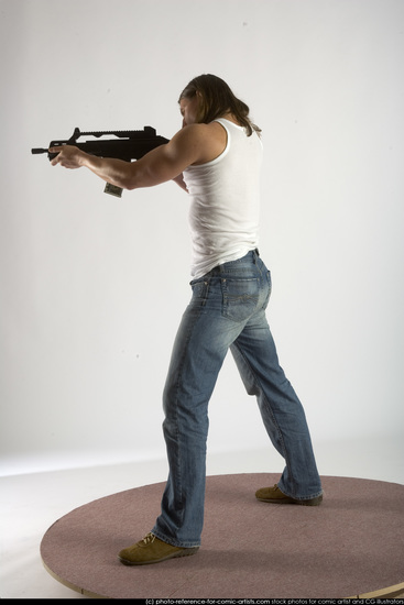 Man Young Muscular White Fighting with submachine gun Standing poses Casual