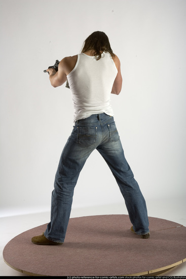 Man Young Muscular White Fighting with submachine gun Standing poses Casual