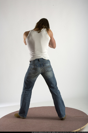 Man Young Muscular White Fighting with submachine gun Standing poses Casual