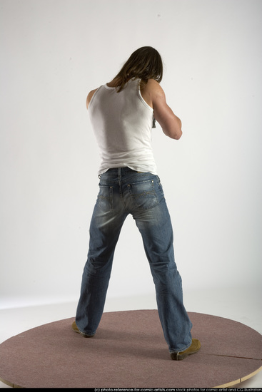 Man Young Muscular White Fighting with submachine gun Standing poses Casual