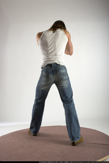 Man Young Muscular White Fighting with submachine gun Standing poses Casual