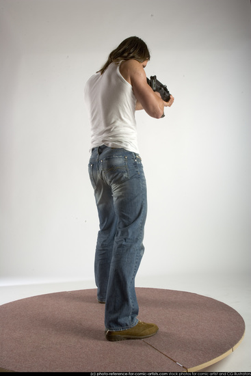 Man Young Muscular White Fighting with submachine gun Standing poses Casual