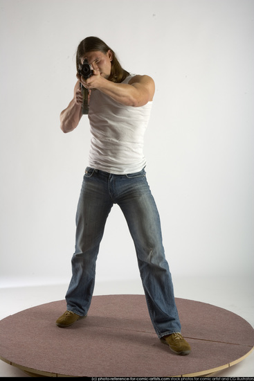 Man Young Muscular White Fighting with submachine gun Standing poses Casual