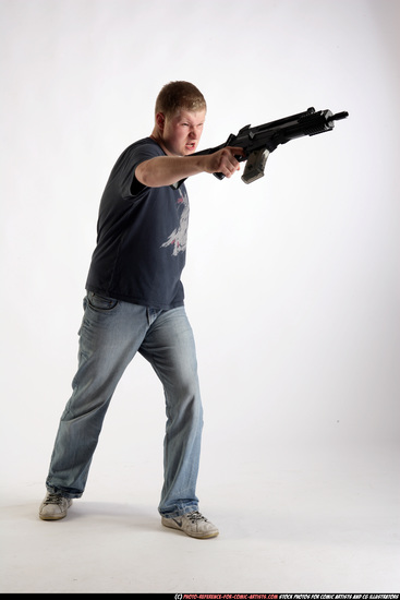 Man Adult Average White Fighting with submachine gun Standing poses Sportswear