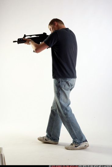 Man Adult Average White Fighting with submachine gun Moving poses Sportswear