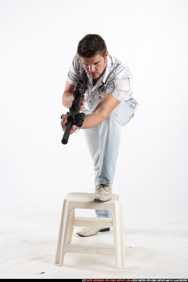 Man Adult Average White Fighting with submachine gun Standing poses Casual