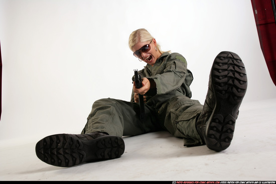 Woman Adult Athletic White Fighting with submachine gun Laying poses Army