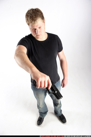 Man Adult Average White Fighting with gun Standing poses Sportswear