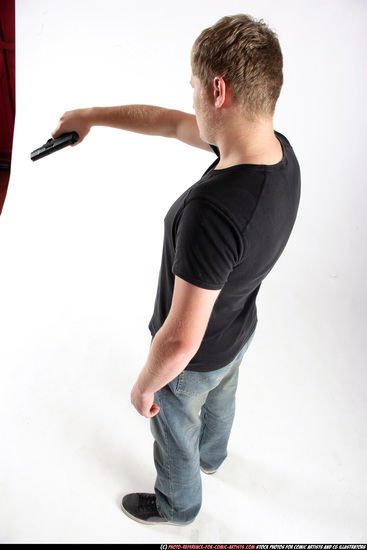 Man Adult Average White Fighting with gun Standing poses Sportswear