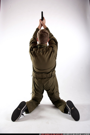 Man Young Average White Fighting with gun Kneeling poses Army