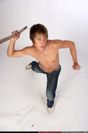 Man Young Muscular White Fighting with spear Kneeling poses Pants