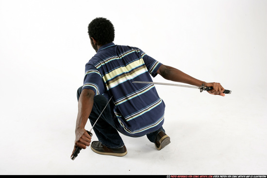 Man Young Athletic Black Fighting with sword Kneeling poses Sportswear