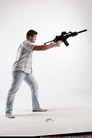 Man Adult Average White Fighting with submachine gun Standing poses Casual