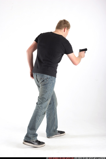 Man Adult Average White Fighting with gun Standing poses Sportswear