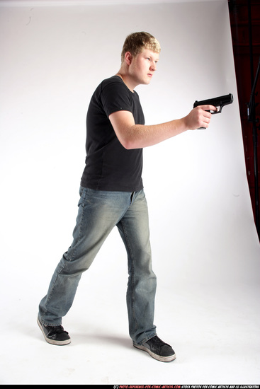 Man Adult Average White Fighting with gun Standing poses Sportswear