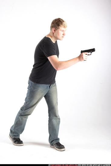 Man Adult Average White Fighting with gun Standing poses Sportswear