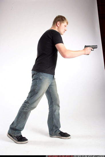 Man Adult Average White Fighting with gun Standing poses Sportswear