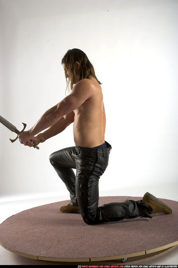 Man Adult Muscular White Fighting with sword Kneeling poses Pants