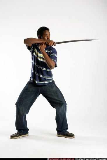 Man Adult Athletic Black Fighting with sword Standing poses Sportswear