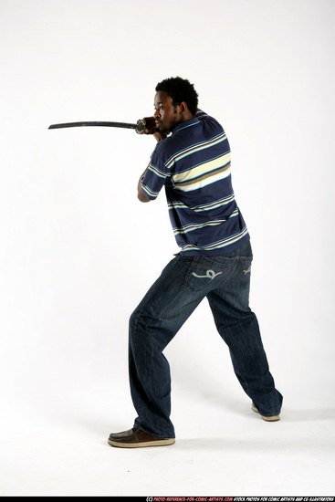 Man Adult Athletic Black Fighting with sword Standing poses Sportswear