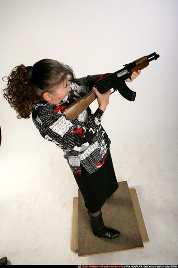 Woman Old Average White Fighting with submachine gun Standing poses Casual