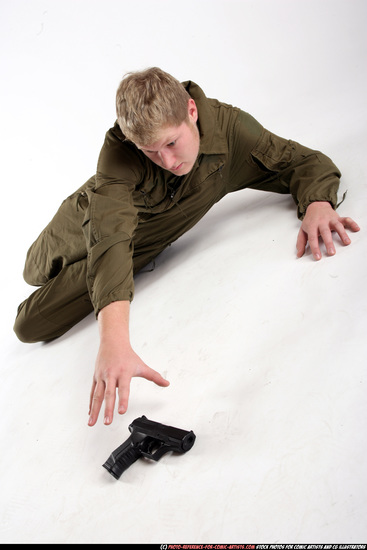 Man Young Average White Martial art Laying poses Army