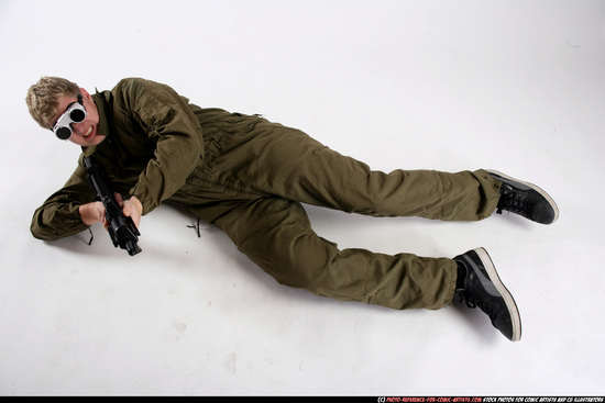 Man Adult Average White Fighting with submachine gun Laying poses Army