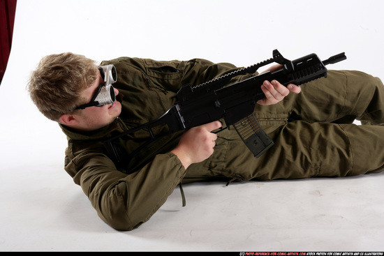 Man Adult Average White Fighting with submachine gun Laying poses Army