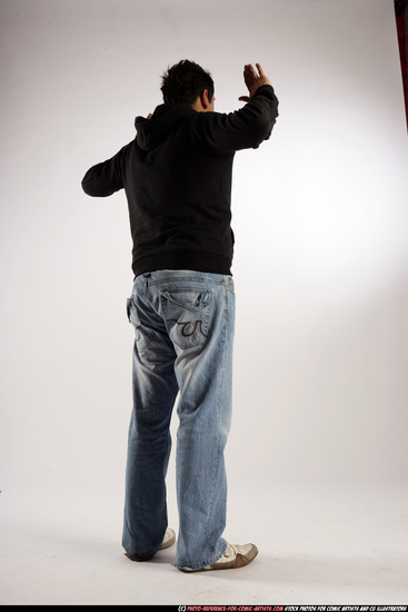 Man Adult Average Black Neutral Standing poses Sportswear