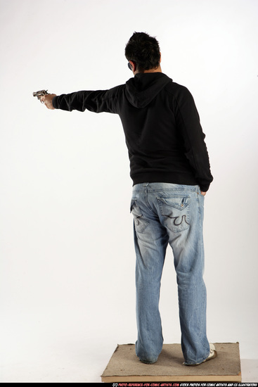 Man Adult Average Black Fighting with gun Standing poses Sportswear