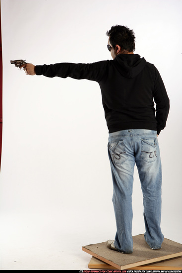 Man Adult Average Black Fighting with gun Standing poses Sportswear