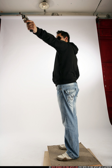 Man Adult Average Black Fighting with gun Standing poses Sportswear