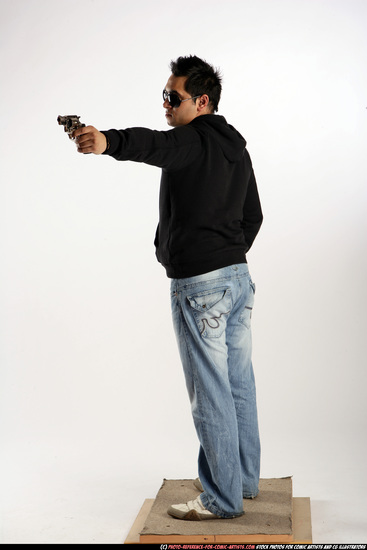 Man Adult Average Black Fighting with gun Standing poses Sportswear