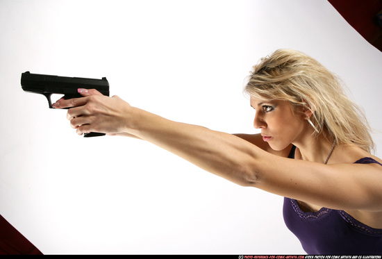 Woman Adult Athletic White Fighting with gun Kneeling poses Sportswear