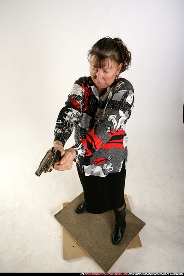 Woman Old Average White Fighting with gun Standing poses Casual