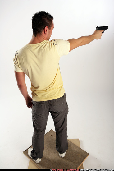 Man Adult Athletic White Fighting with gun Standing poses Sportswear