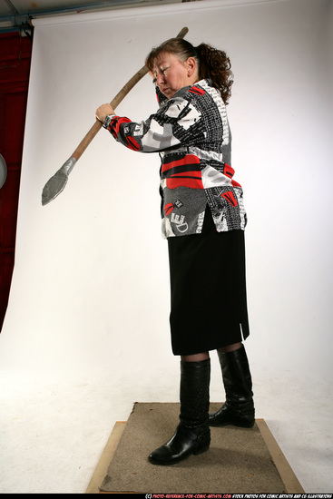 Woman Old Average White Fighting with spear Standing poses Casual