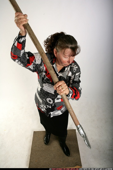 Woman Old Average White Fighting with spear Standing poses Casual