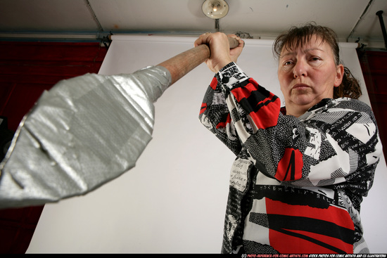 Woman Old Average White Fighting with spear Standing poses Casual