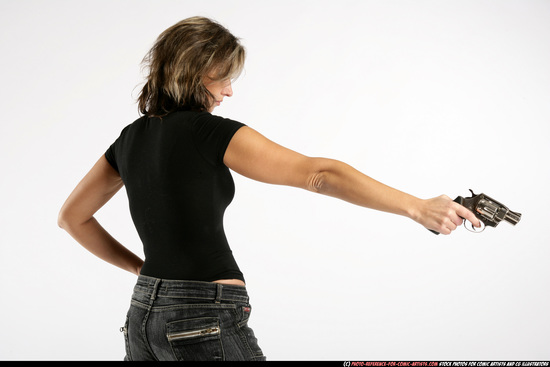 Woman Adult Average White Fighting with gun Standing poses Casual