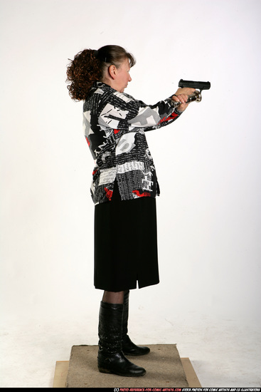 Woman Old Average White Fighting with gun Sitting poses Casual