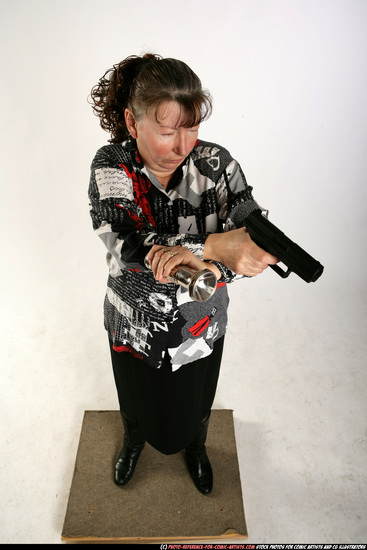 Woman Old Average White Fighting with gun Sitting poses Casual