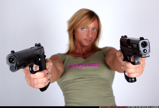 Woman Adult Muscular White Fighting with gun Sitting poses Sportswear