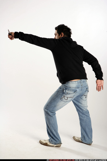 Man Adult Average Black Fighting with knife Standing poses Sportswear