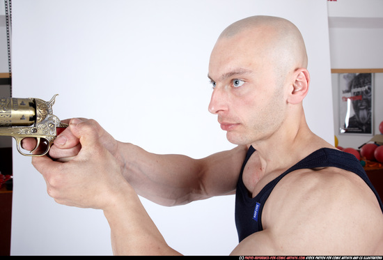 Man Adult Muscular White Fighting with gun Standing poses Sportswear