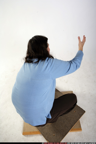 Woman Old Chubby White Martial art Kneeling poses Casual