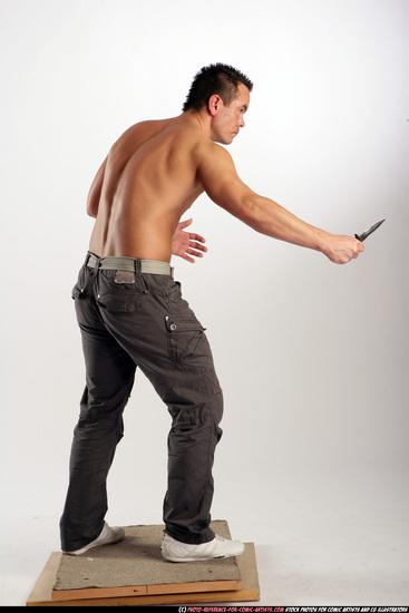 Man Adult Athletic White Fighting with knife Standing poses Pants