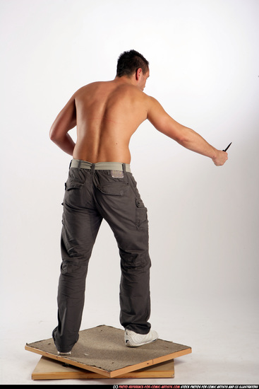 Man Adult Athletic White Fighting with knife Standing poses Pants